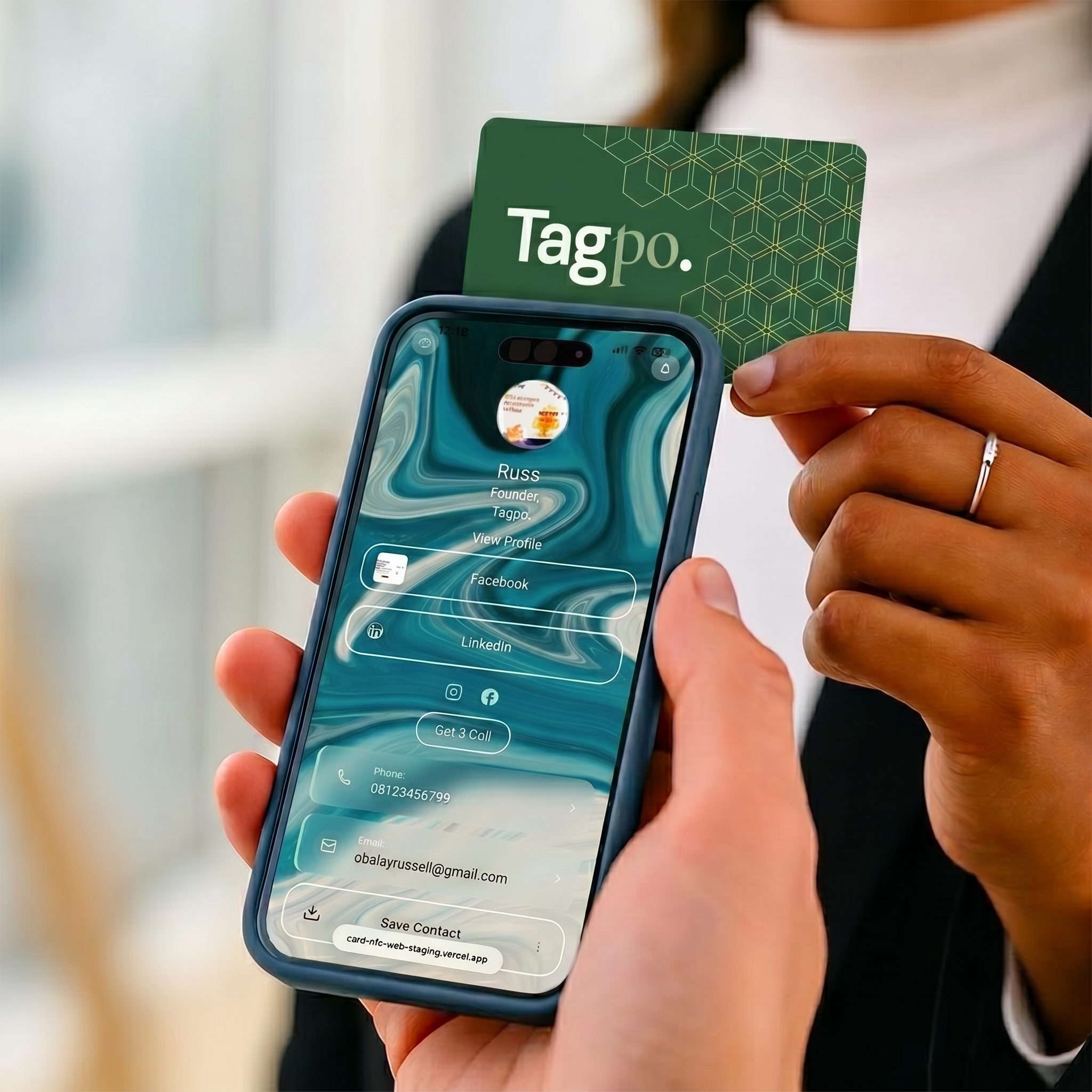 Tagpo NFC card tapped against phone